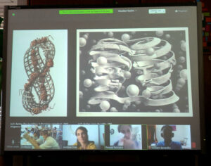 No quadro interativo, podemos ver dois quadros de Escher que parecem feitos a partir de uma tira de Moebius.