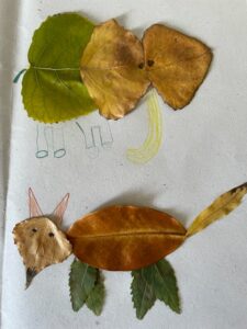 Folhas coladas complementadas com desenhos para parecerem animais ou pessoas